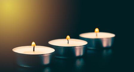 background with candle and bright flame, religious postcardの写真素材