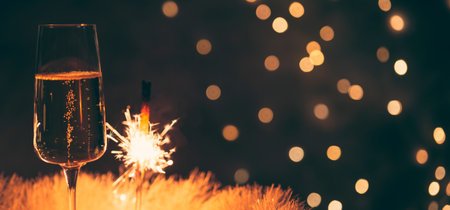 champagne glass with sparkler, festive background, vintage colors