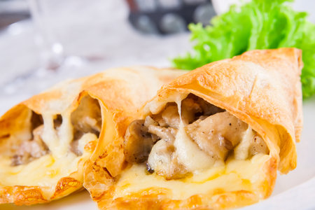 Mushrooms and cheese baked in pita breadの写真素材