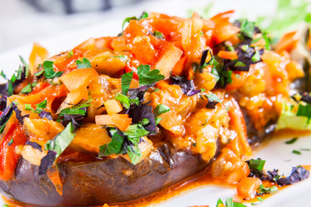 Stuffed eggplant with fried vegetablesの写真素材