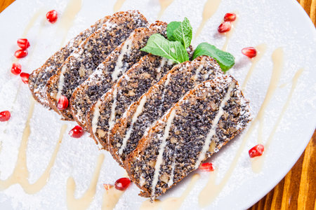 Cake with poppy seed and hazelnutsの写真素材