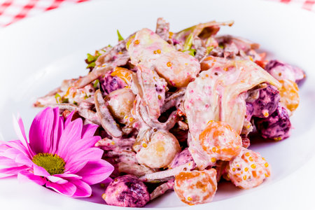 Salad with baked vegetables and tongueの写真素材