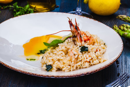 Risotto with seafood on white plate.の写真素材
