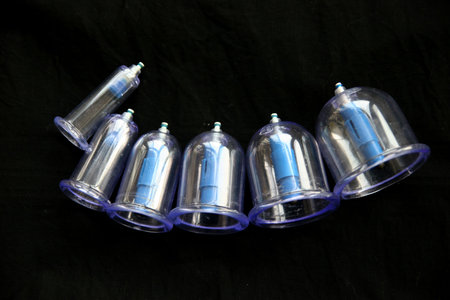 Cans, cans of treatment, and a black background
