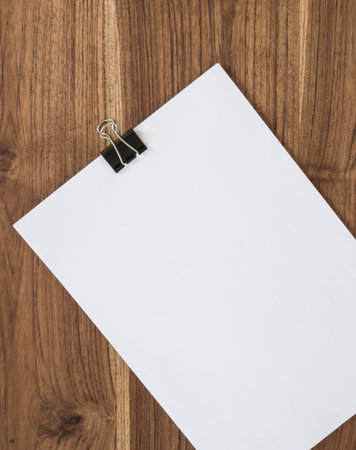 blank paper with clip on board.