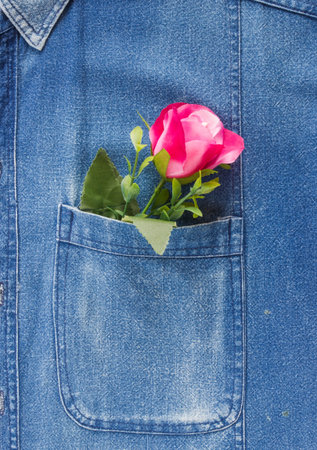 Closeup shot of local jean shirt with fabric rose.の写真素材