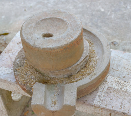 Ancient stone mill,closeup shot.の写真素材