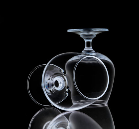Empty crystal wineglasses,shot on black isolated.の写真素材