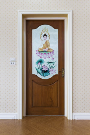 Teak wood door with mirror glass - Background.の写真素材