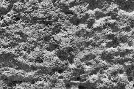 Abstract Stone Wall Background Texture with Contrast Lighting and Shadow.の写真素材