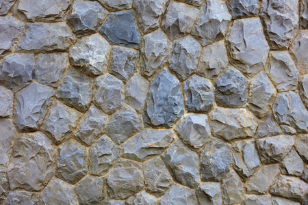 Surface of stone wall with cement background texture.の写真素材