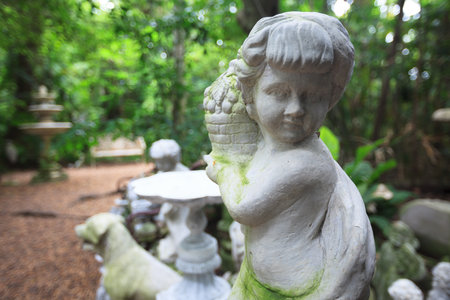 Cupid Statue sculpture in the garden.の写真素材