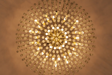 Lamp chandelier hanging from the ceiling in warm tone. - (Close up and Ant eye view)の写真素材