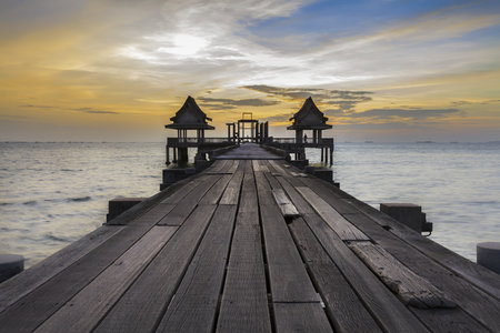 The wooden Bridge and pavilion into sea at the Djittabhawan Temple Chonburi , Thailand.の写真素材