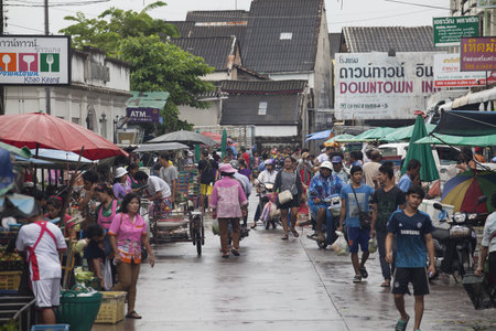 Phuket, Thailand - September 30, 2015: Crowd of people are shopping at fresh-food market in the early morning.のeditorial素材