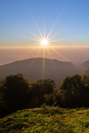View of Sun and mountain in the morning time. - Selective focusの写真素材