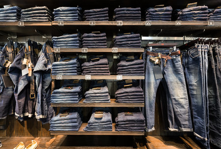 Nonthaburi, Thailand - February 24, 2016: Jeans at shelf in the "CC DOUBLE O" american luxury shop.のeditorial素材