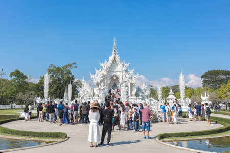 Chiang Rai, Thailand - January 22, 2017: Unidentified tourists are at Wat Rong Khun or White Temple, Landmark in Chiang Rai, Thailand. -This is a contemporary unconventional Buddhist temple.のeditorial素材