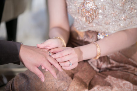 Wedding ceremony. The bride and groom exchange wedding rings.の写真素材