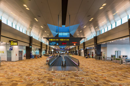 Interior of Terminal 1 in Changi Airport Singapore . Singapore Changi Airport is the primary civilian airport for Singapore and one of the largest transportation hubs in Southeast Asia.のeditorial素材