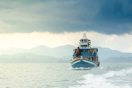 Thai fishing boat sailing sea background.の写真素材