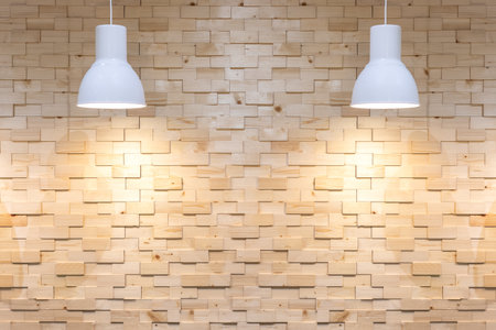 Interior empty wooden wall background with lamps over.の写真素材