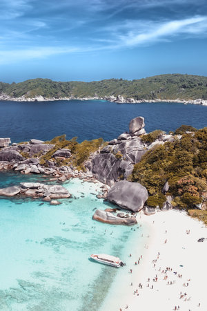 Aerial view over one of Similan island and it's shape look like heart in sea with green tree forest and blue or turquoise color in Thailand.の写真素材