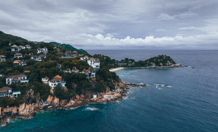 Aerial view of "Ko Kong Sai Daeng" or "Shark Bay" is an islet in Thailand. Ko Kong Sai Daeng is situated nearby to Ao Sai Daeng, and close to New Heaven Huts, Chumphon province, Thailand.の写真素材