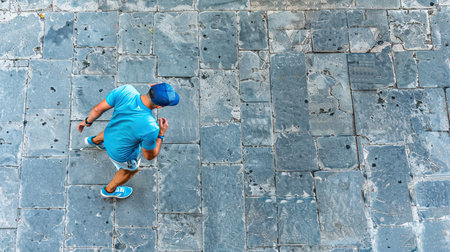 Running man sprinting for success on run. Top view athlete. AI Generated.の素材