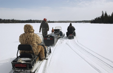 Snowmobiling in rural Manitobaの写真素材