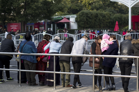 Queuing up beside of the roadのeditorial素材