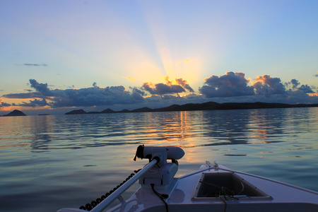 Colorful sunrise on a beautiful still morning fishing in Australiaの写真素材