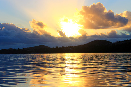 Peaceful sunrise by the sea. Vacation, leisure and relaxation on the sea side.の写真素材