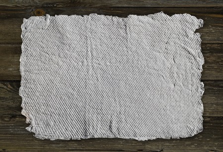 Handmade paper texture background with stripes patternの写真素材