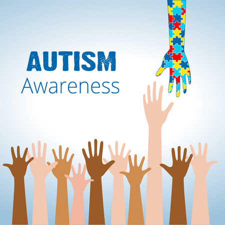 Autism awareness concept with hand of puzzle pieces as symbol of autism.のイラスト素材
