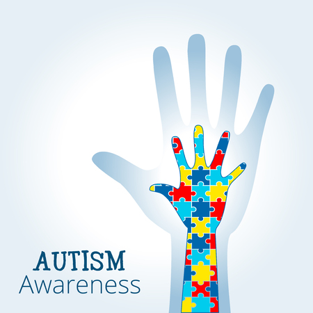 Autism awareness concept with hand of puzzle pieces as symbol of autism.のイラスト素材