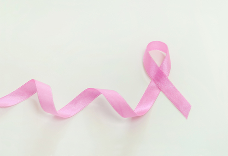 Breast cancer concept, pink ribbon on backgroundの写真素材