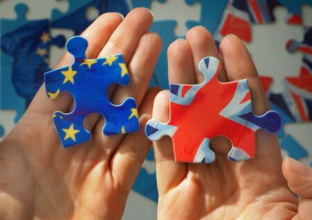 Puzzle with Great Britain and European Union flags. Brexit conceptの写真素材