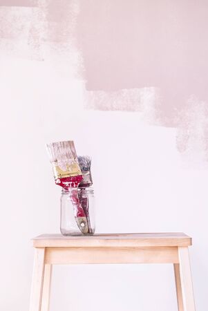 Painting equipment, paintbrushes with a pink backgroundの写真素材