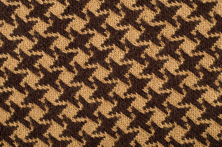 Closeup on brown houndstooth wool pattern. Closeup on brown houndstooth wool pattern.の写真素材