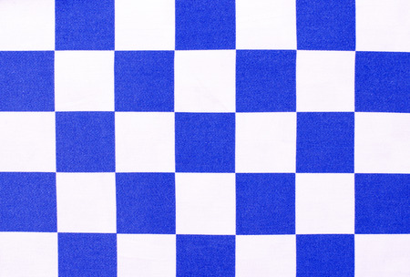 White and blue chequer background. Checker pattern on fabric.の写真素材
