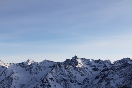 Winter alpine mountains covered with snowの写真素材