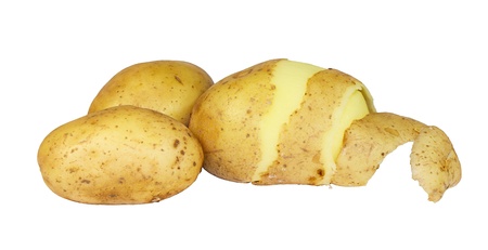 Peeled potatoes isolated on white backgroundの写真素材