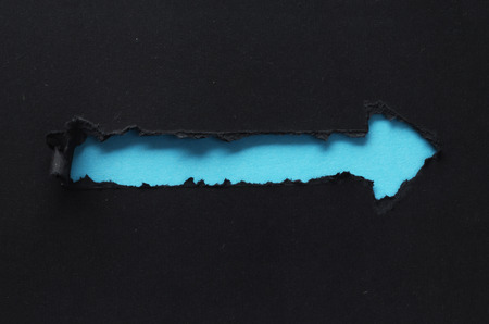 Illustration of arrow shape in torn paper with copy spaceの写真素材