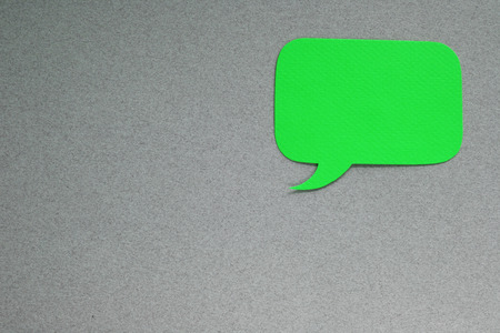 One paper dialog box on gray background with blank empty copy spaceの写真素材