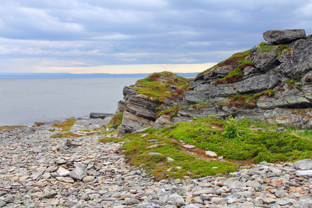Northern Norwegian landscape with fjords, mountains and shore with mossの写真素材