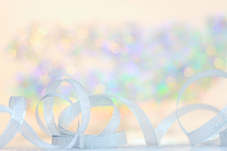 Christmas decoration on abstract glowing bokeh backgroundの写真素材
