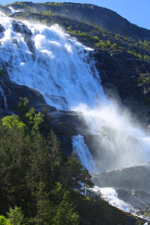 View on Langfossen Langfoss waterfall in summer, Etne, Norwayの写真素材