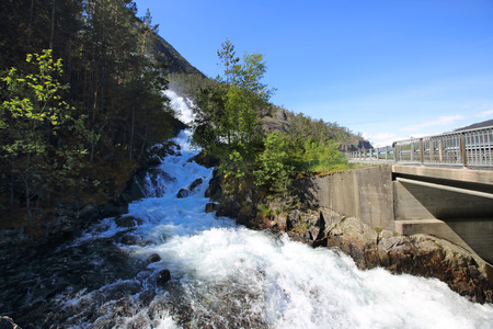 View on Langfossen Langfoss waterfall in summer, Etne, Norwayの写真素材