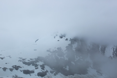Beautiful high foggy mountains in Norway, spring
